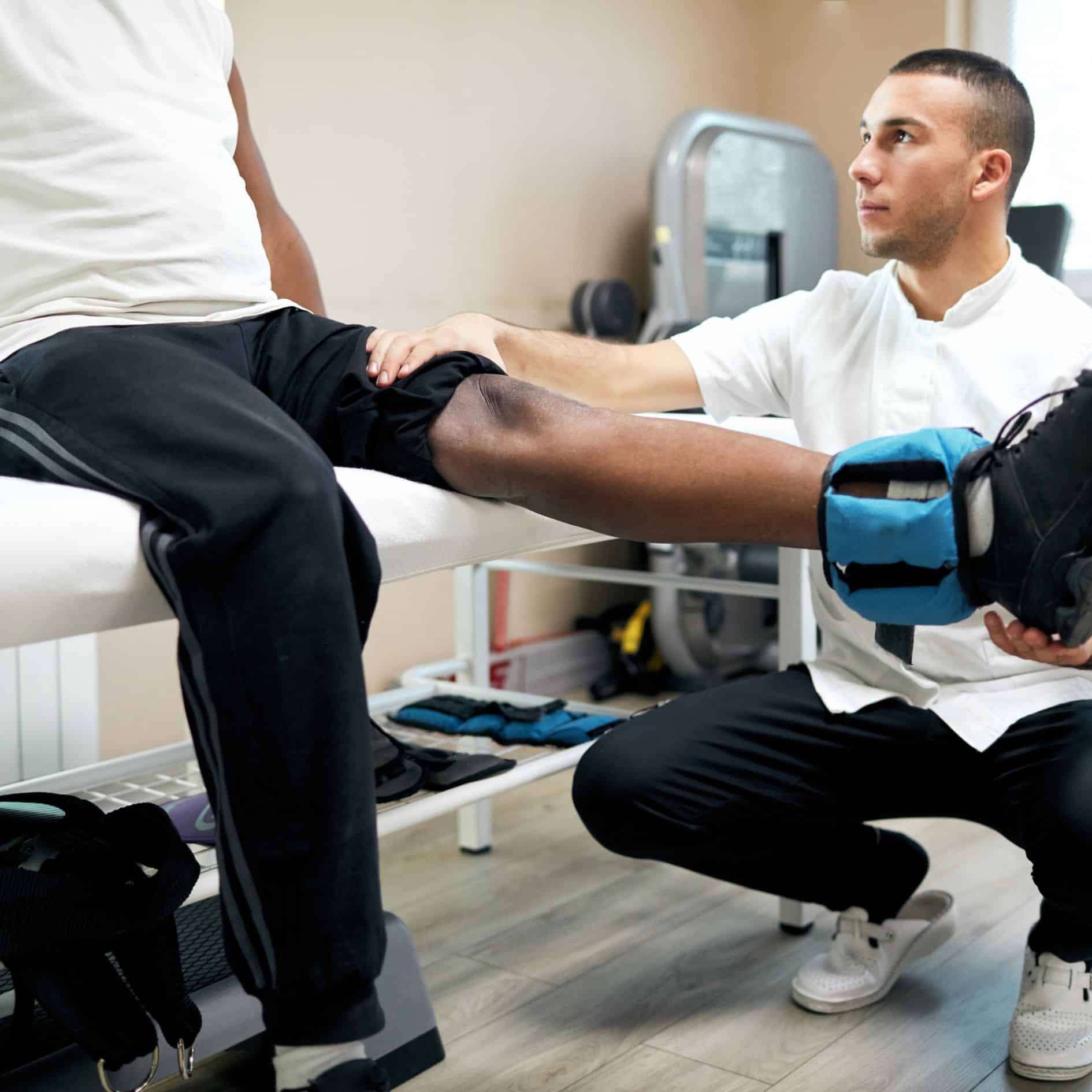 Sports physical therapy being done on a patient