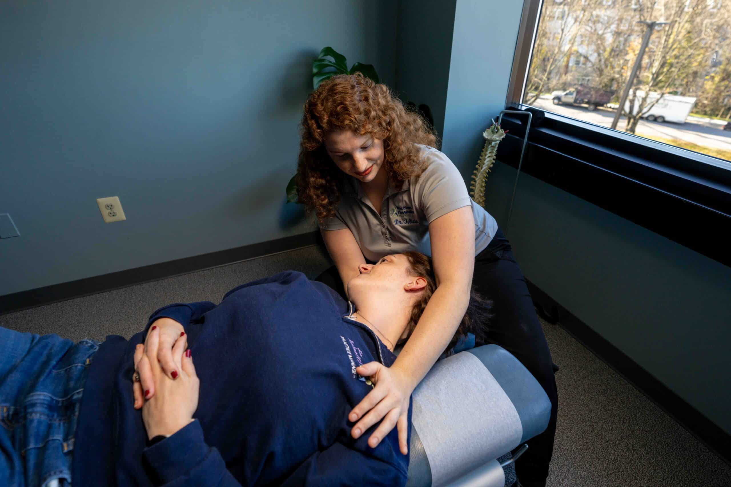 Sports physical therapy being done on a patient
